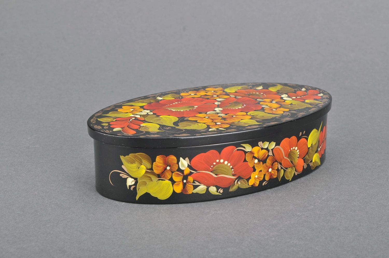 Oval wooden box with floral pattern  photo 1