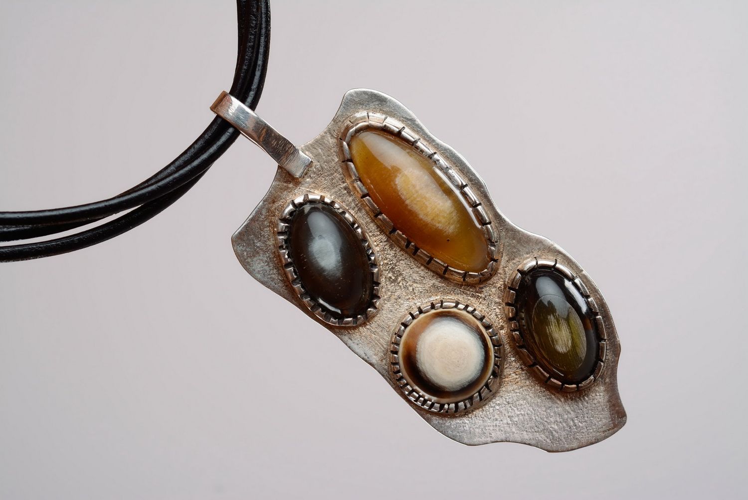 Silver pendant with cow horn photo 5