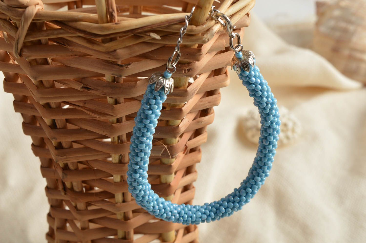 Handmade laconic beaded cord wrist bracelet of blue color for women photo 1