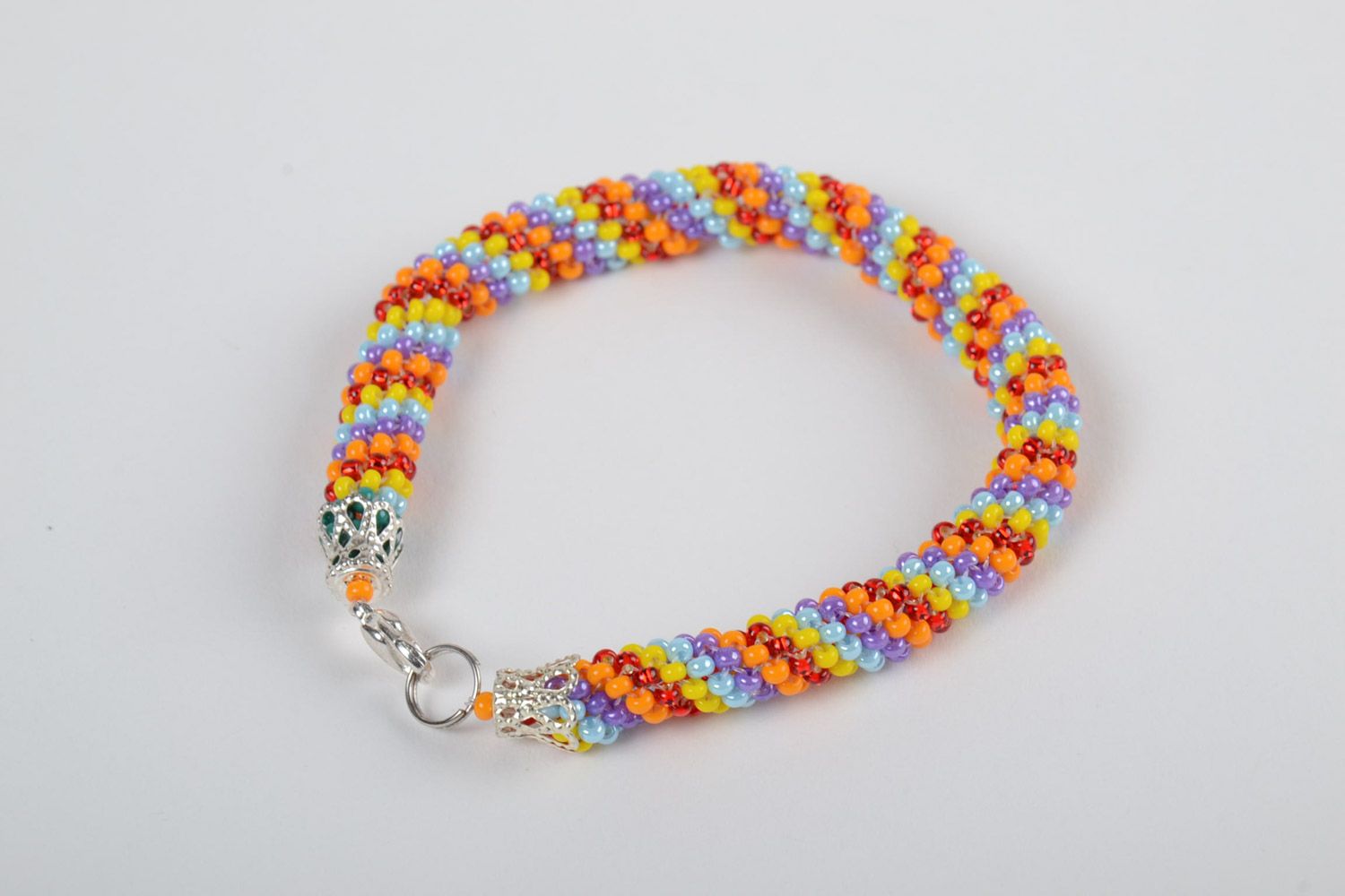 Наручный браслет из чешского бисера жгут плетеный разноцветный ручной работы фото 2