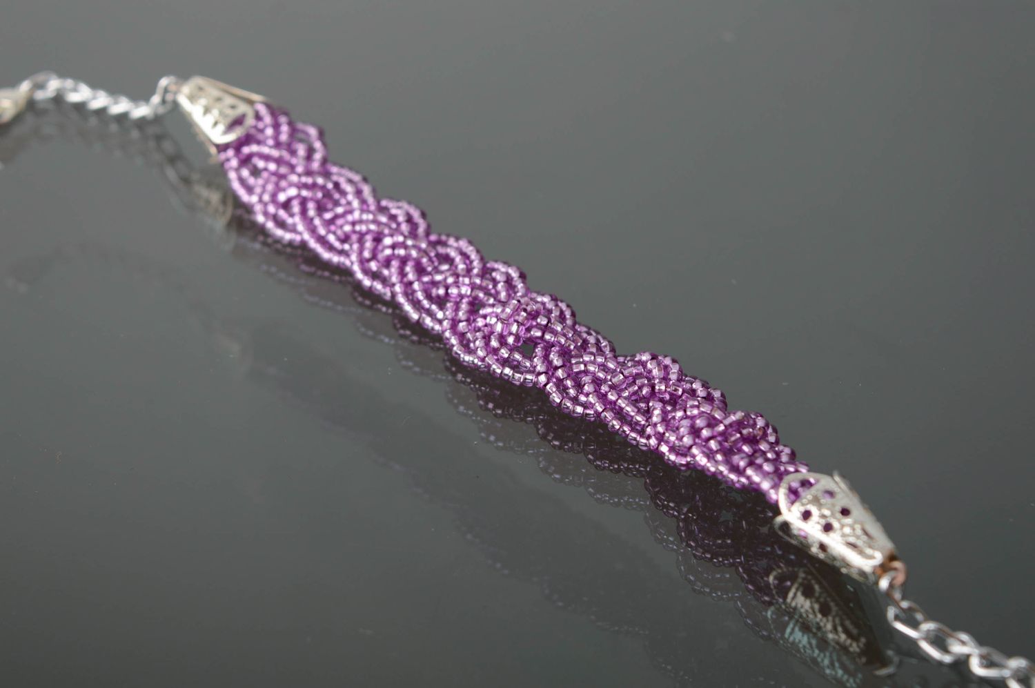 Beaded bracelet of lilac color photo 2