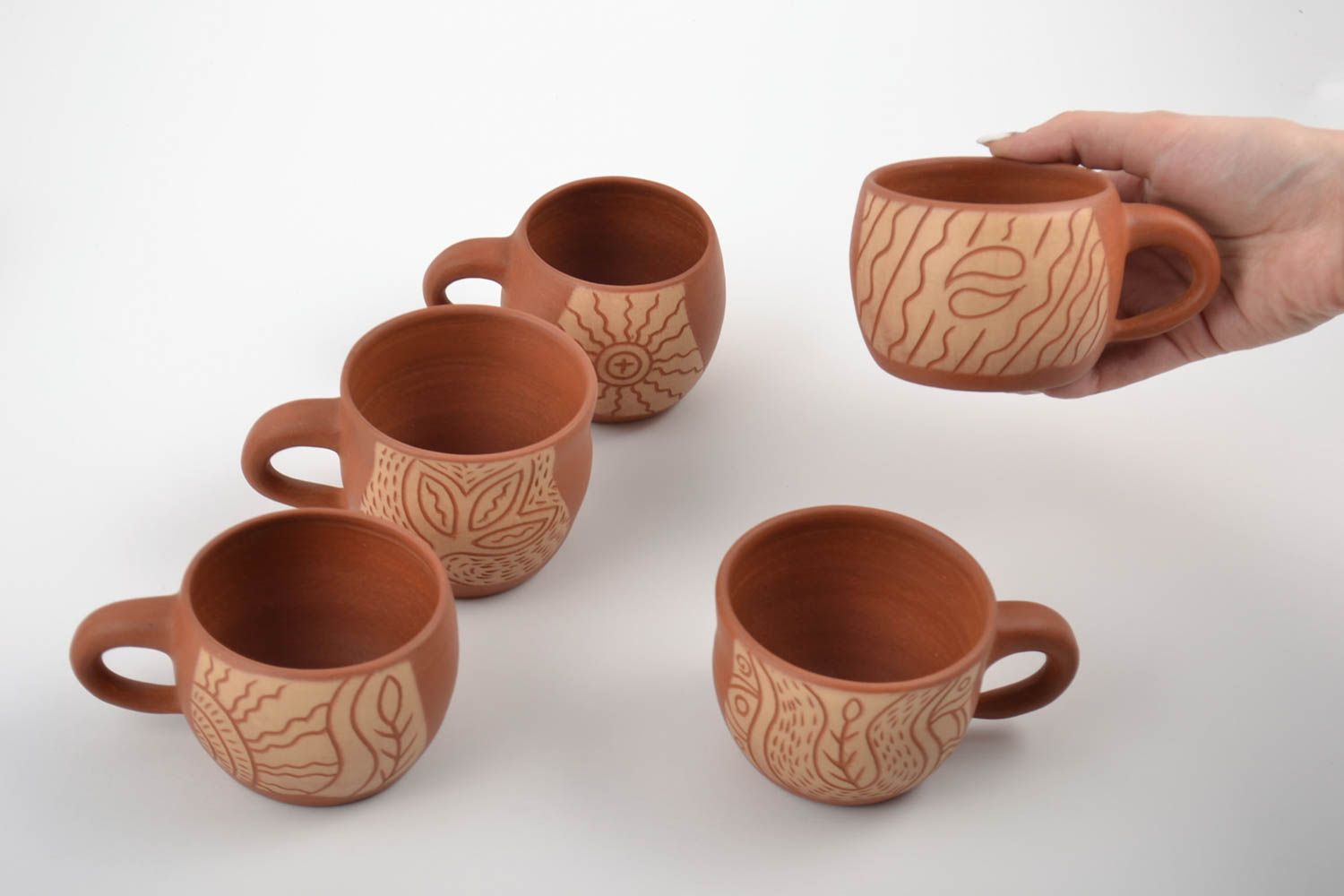 Set of 5 five terracotta natural clay Mexican style coffee cups with cave drawings photo 2