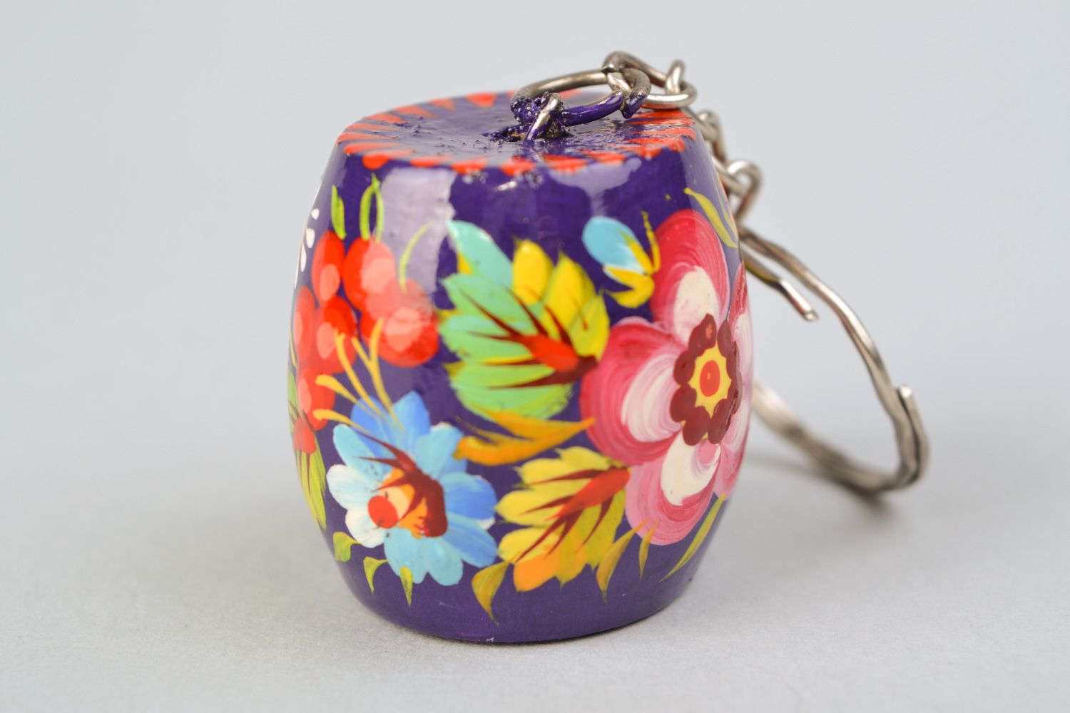 Handmade souvenir barrel-shaped wooden keychain decorated with Petrikivka painting photo 4