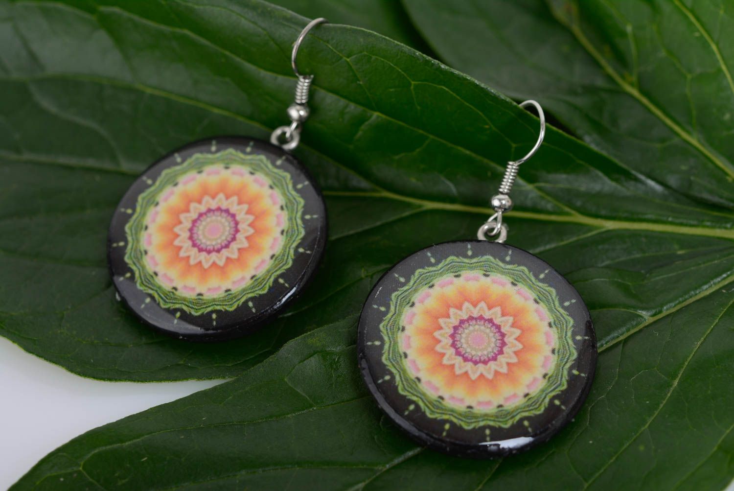 Handmade designer round plastic earrings with ornament in ethnic style photo 1