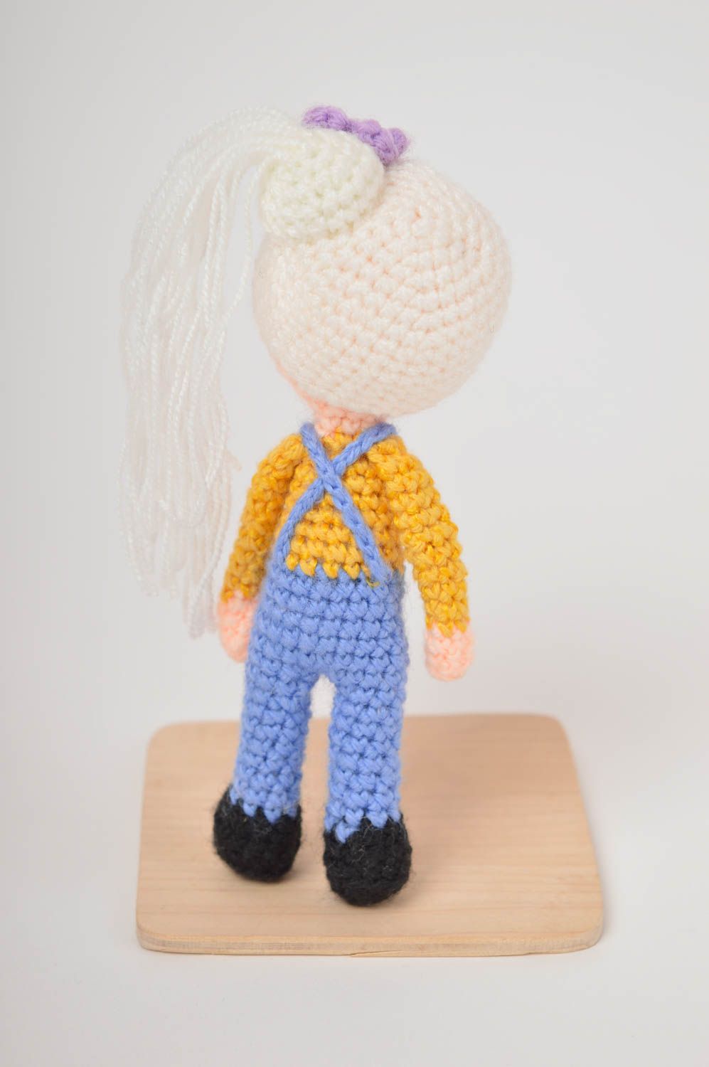 Knitted stuffed girl toy in blue jeans and pink sweater and blond hair. 4 inches tall photo 3