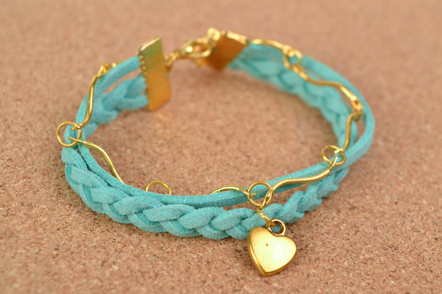 Blue and gold handmade woven suede cord bracelet with heart shaped pandant photo 1