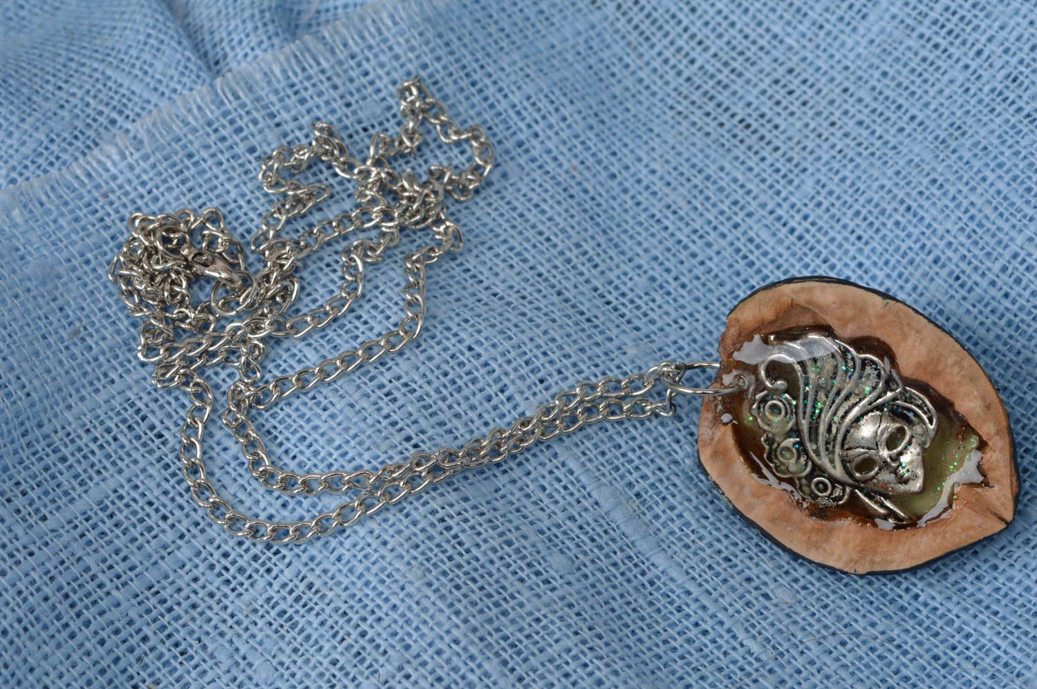 Handmade cute luminous pendant made of nut with metal mask of stranger photo 2