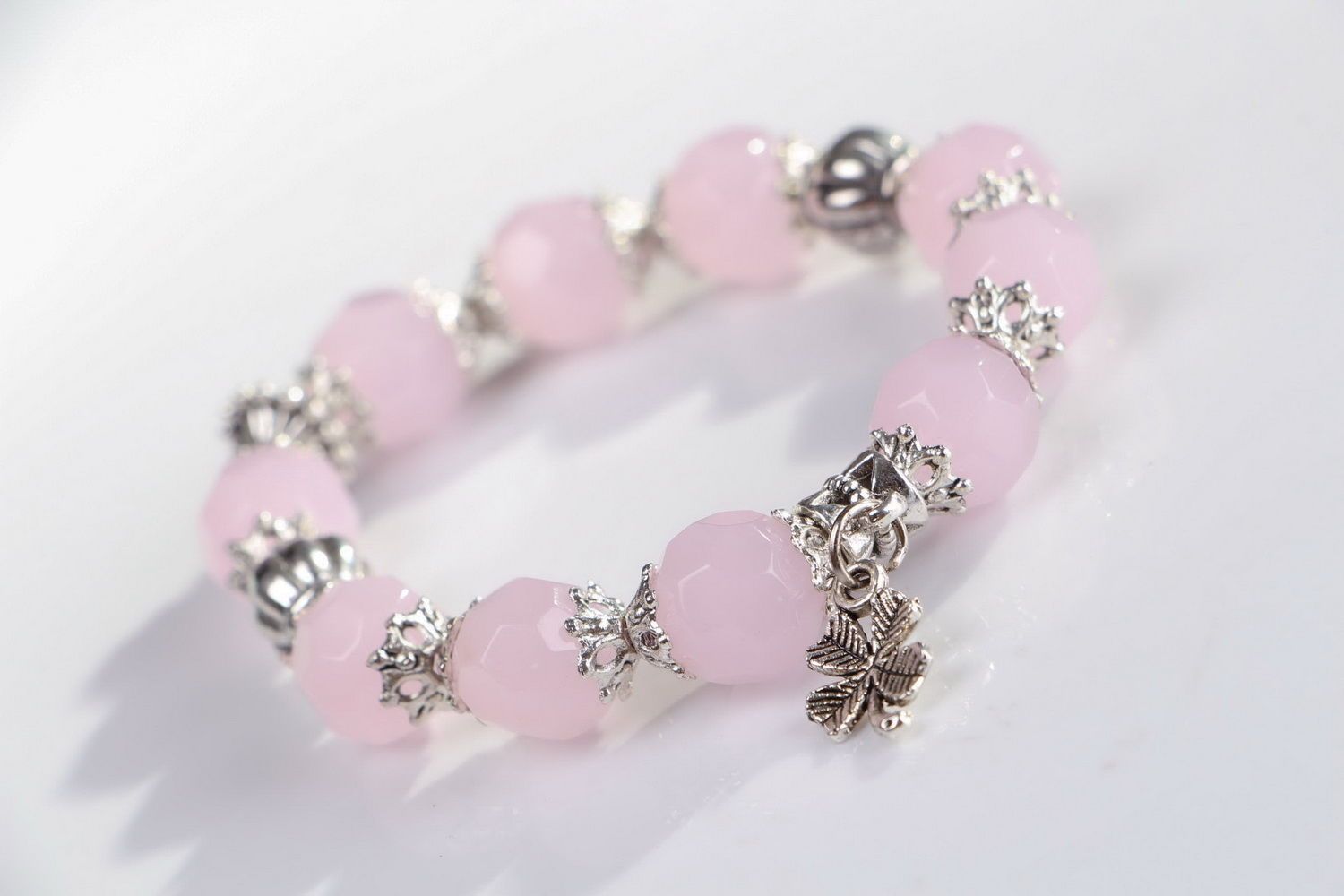 Bracelet with pink quartz and pendants on elastic band photo 1
