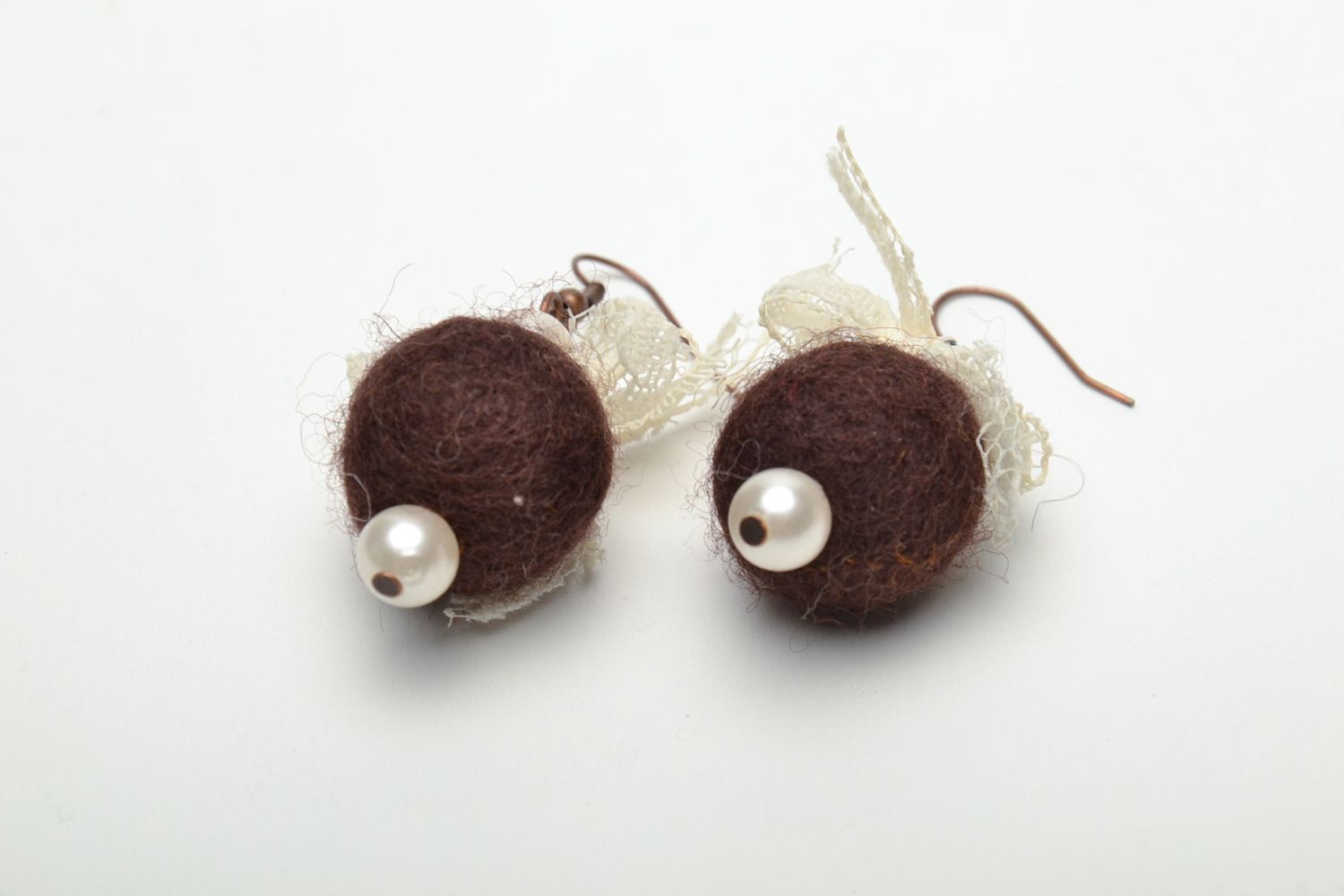 Round felted wool earrings of brown color with pearls photo 3