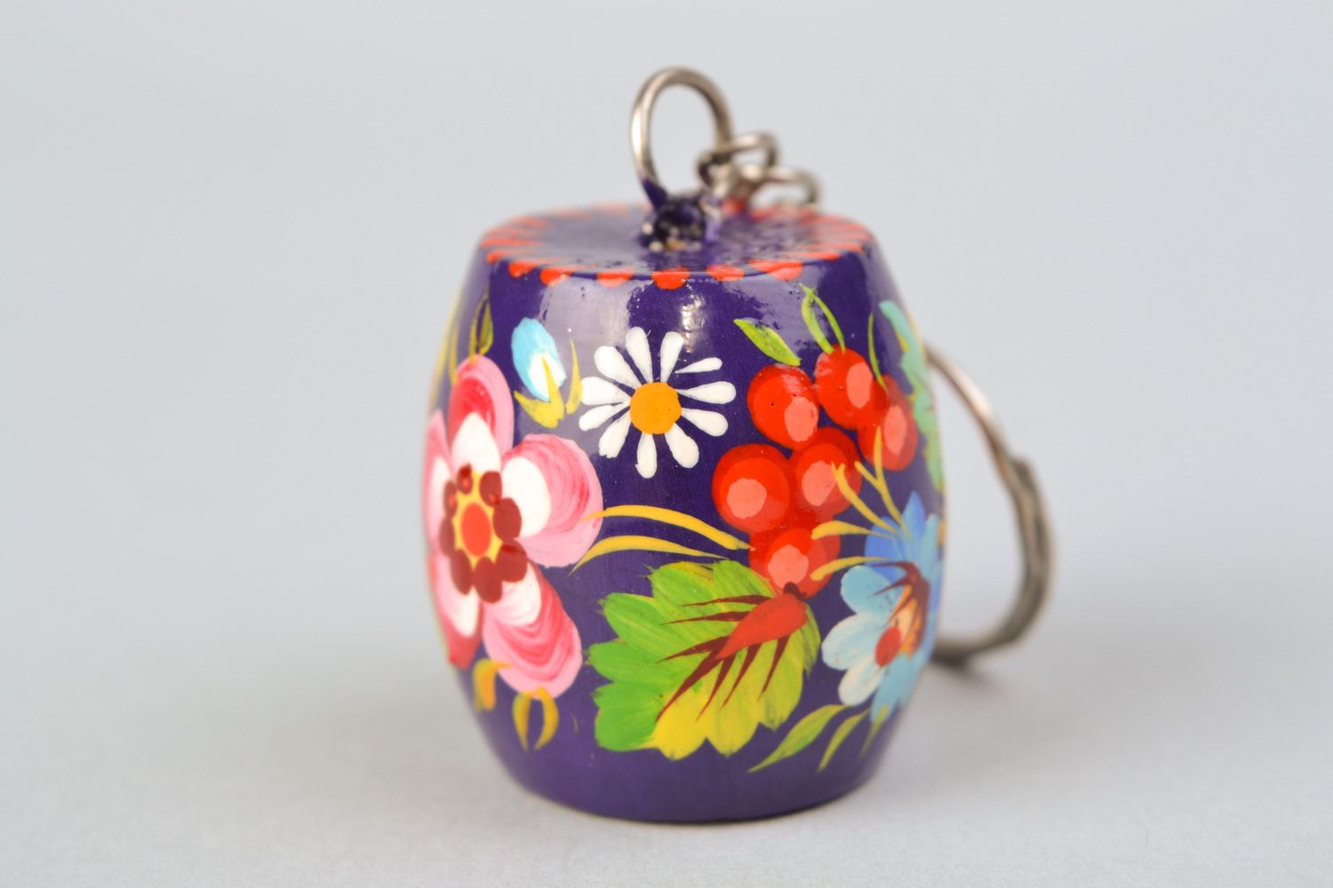 Handmade souvenir barrel-shaped wooden keychain decorated with Petrikivka painting photo 5