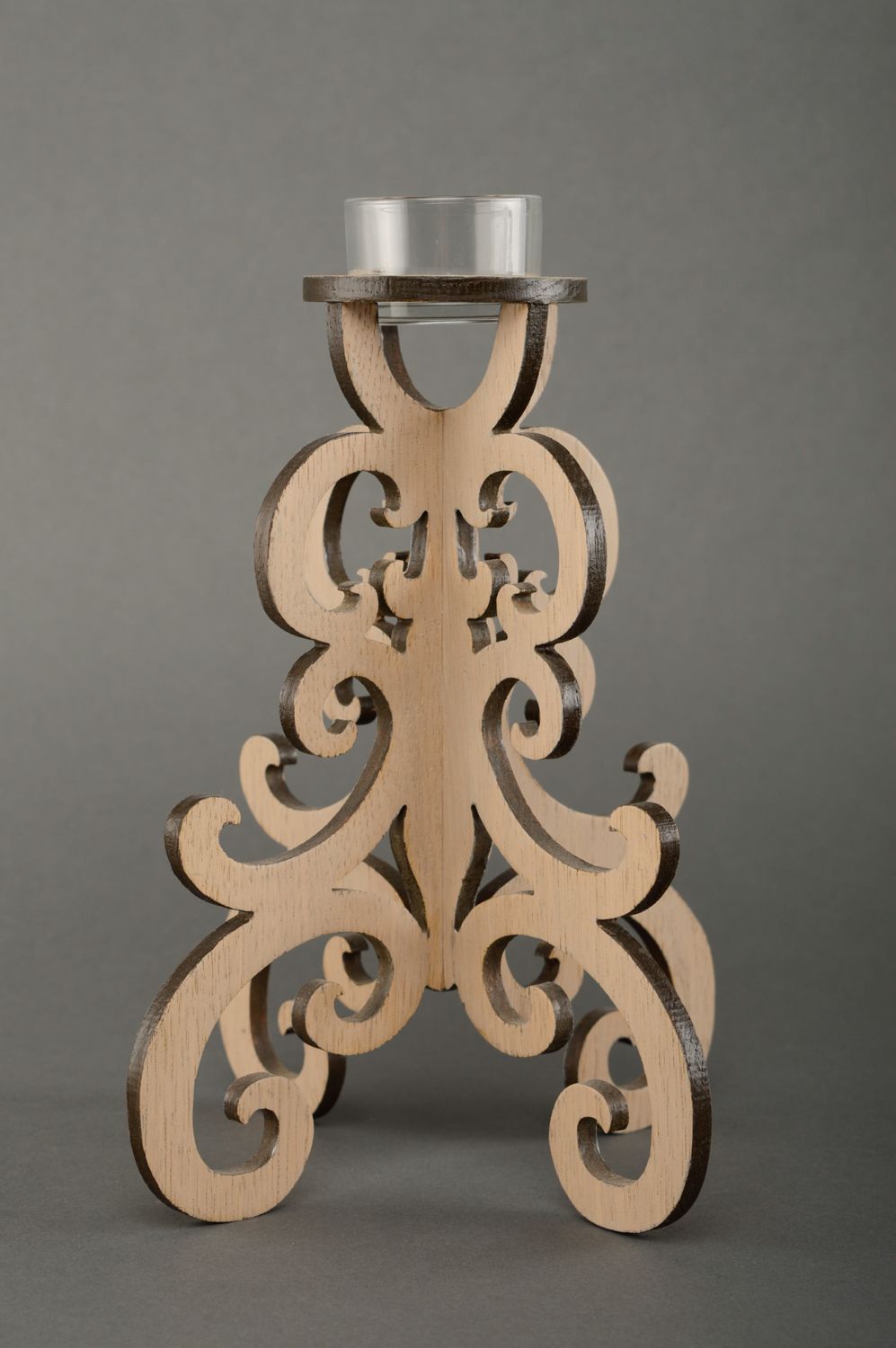 Light carved wooden candlestick photo 1