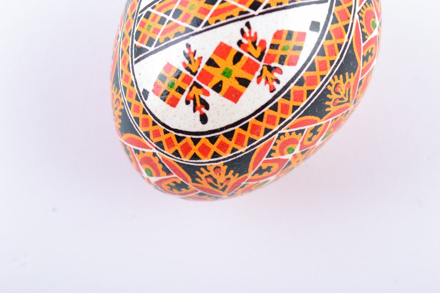 Bright painted handmade Easter chicken egg with beautiful patterns photo 4