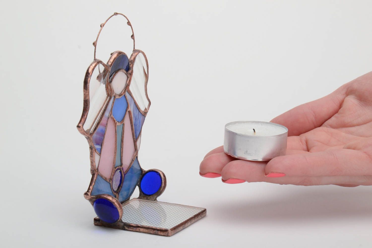 Kleiner handmade Teelichthalter aus Glas für Schaffung von romantischer Atmosphäre foto 5