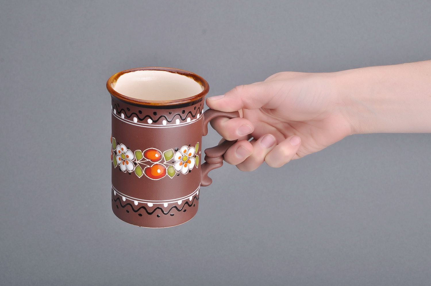 Tall decorative 8 oz glazed cup in brown color with floral design and handle photo 5