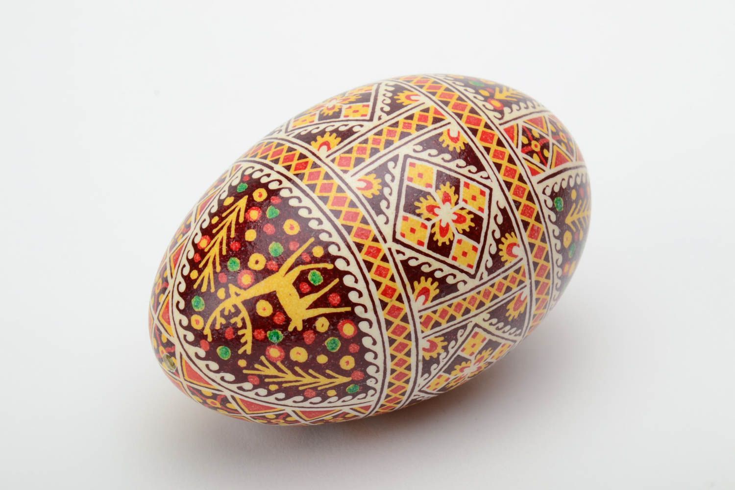 Handmade colorful decorative Easter pysanka goose egg with wax painting photo 2