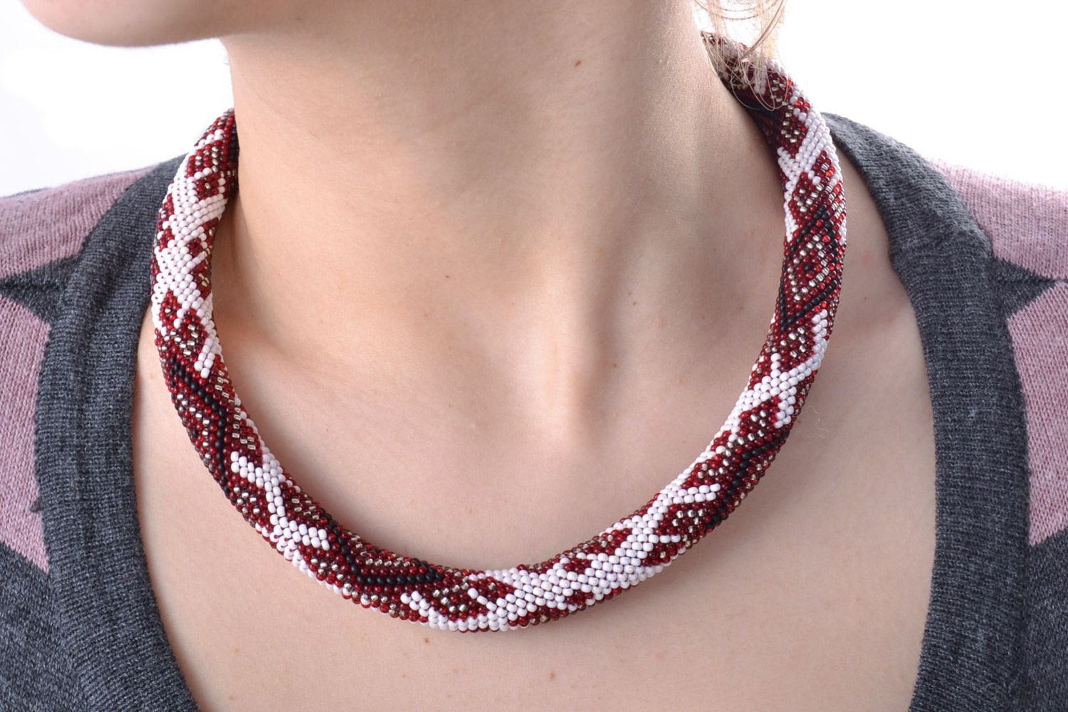Handmade white beaded cord necklace with red patterns in ethnic style photo 1