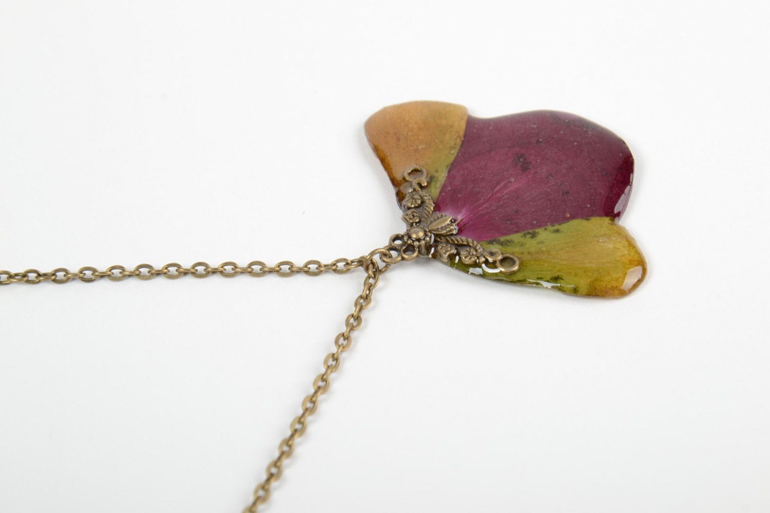Handmade neck pendant on long chain with flower petals coated with epoxy photo 4