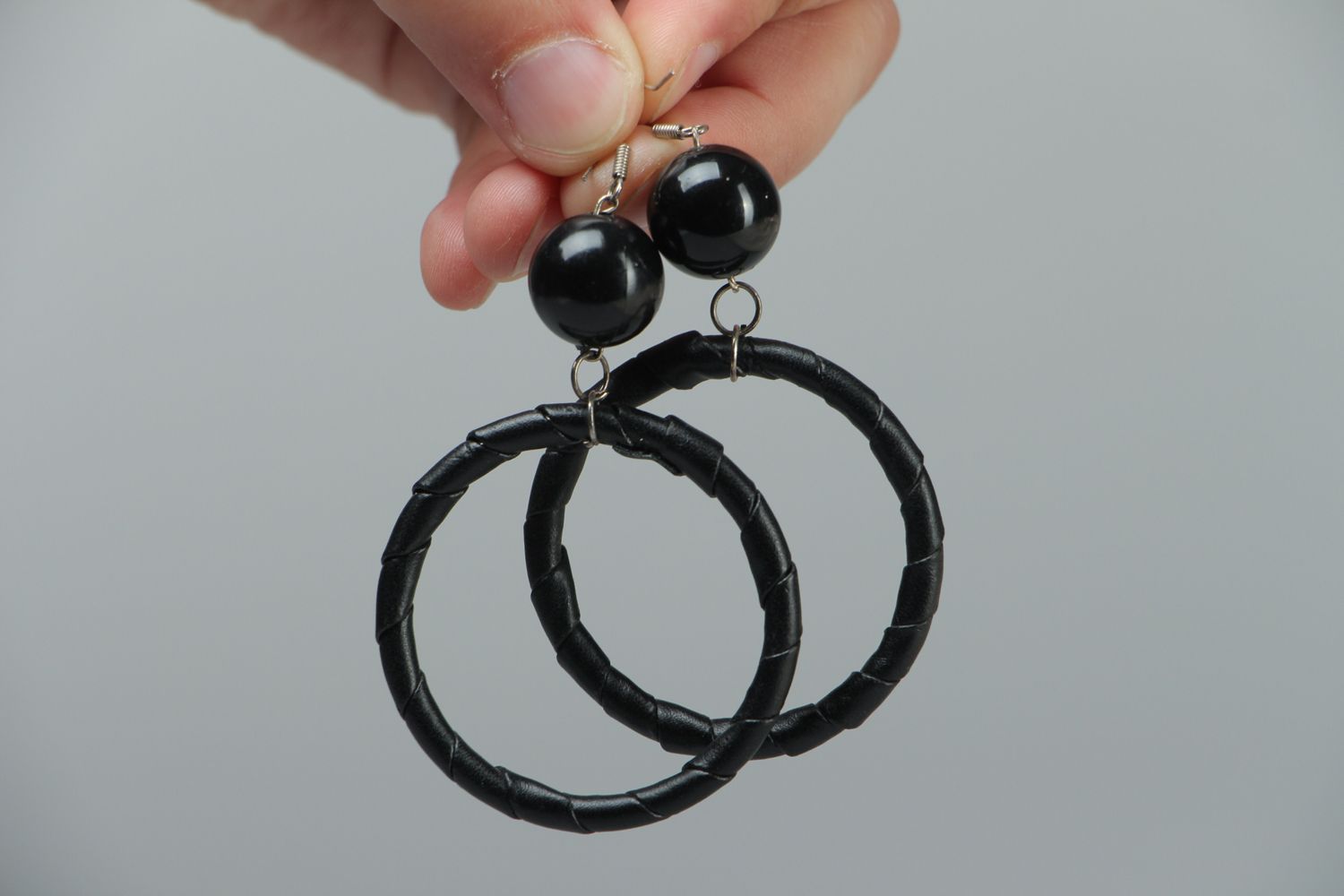 Artificial leather hoop earrings with beads photo 3