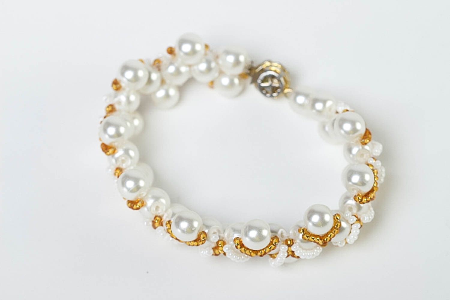 Girls charm beaded bracelet in white and golden colors  photo 2