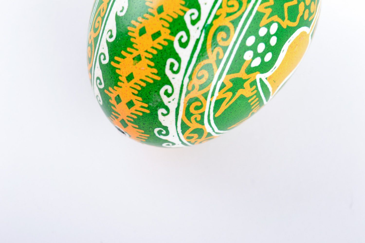 Yellow and green handmade bright painted Easter chicken egg with patterns photo 4