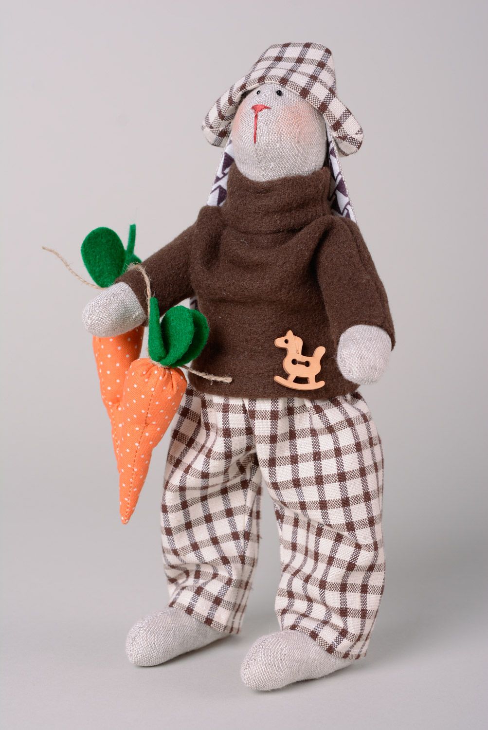 Handmade soft toy sewn of linen and fleece rabbit in checkered suit and hat photo 1