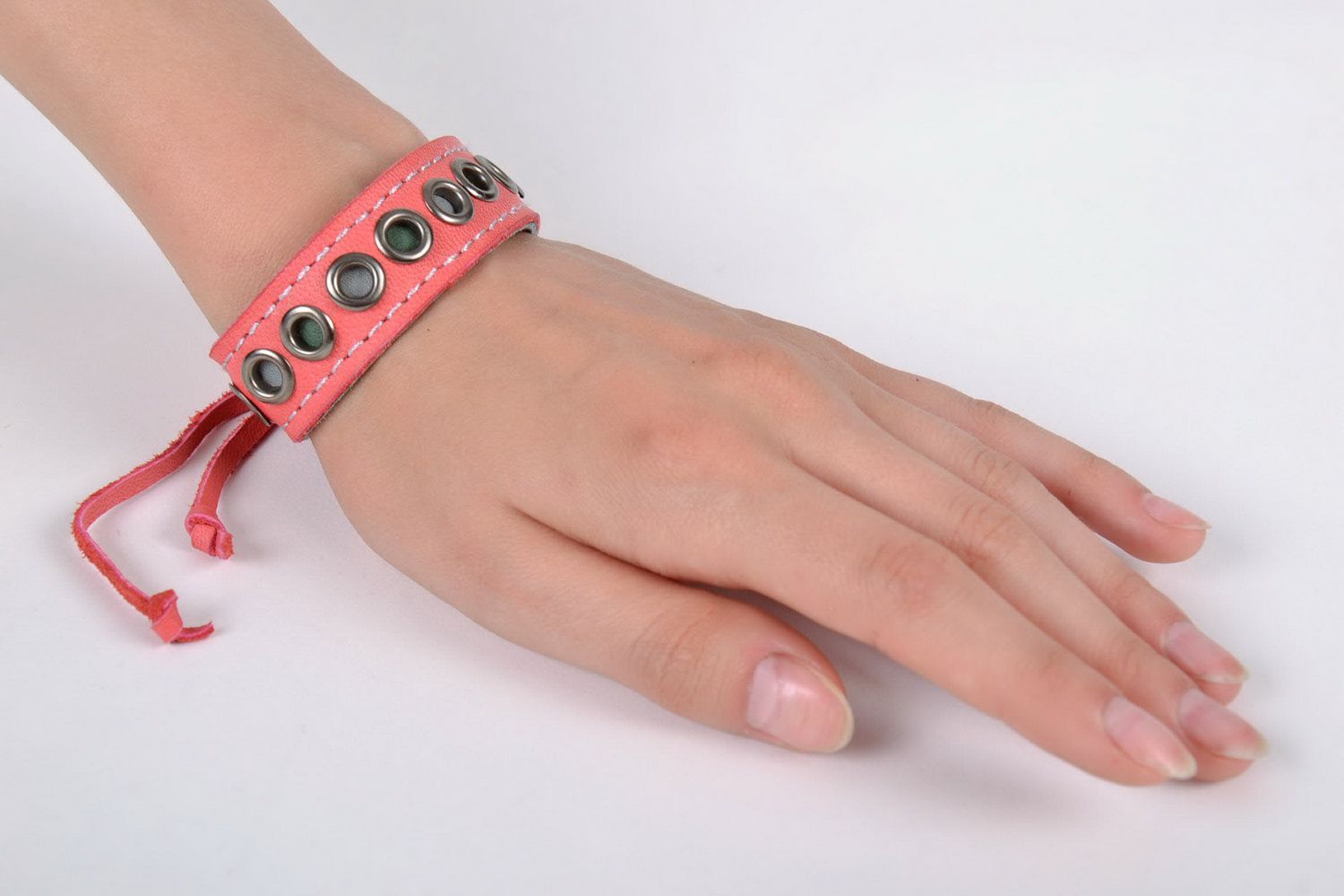 Pink bracelet with rivets photo 5