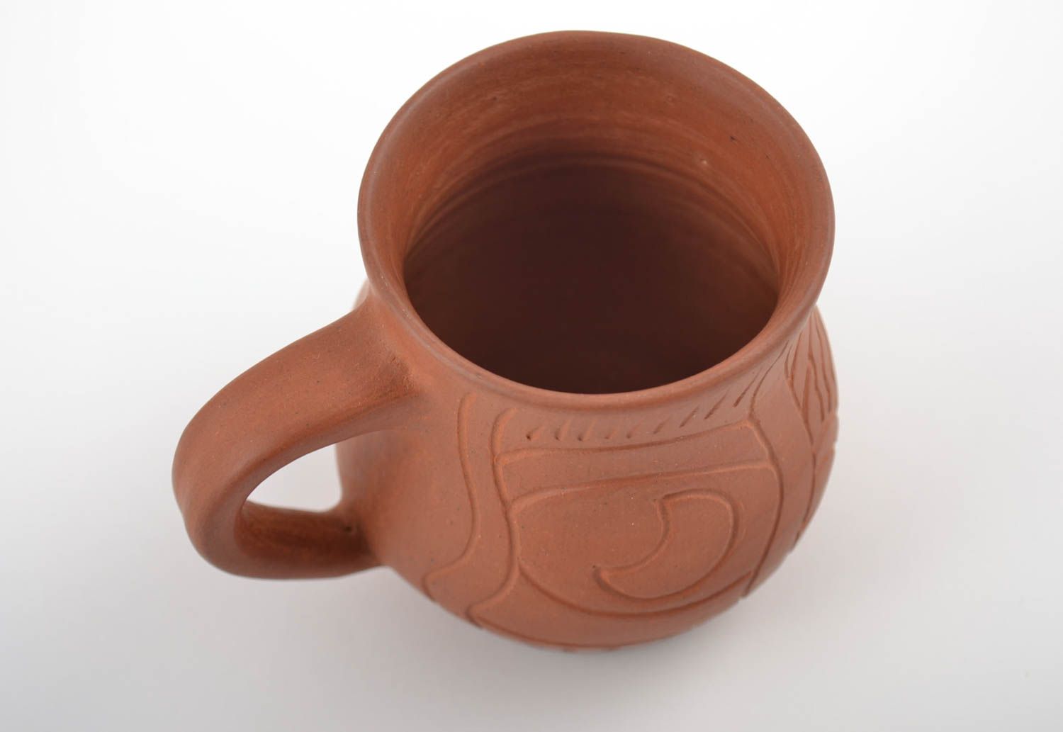 Mexican style 8 oz terracotta color coffee cup with handle and cave drawings photo 3