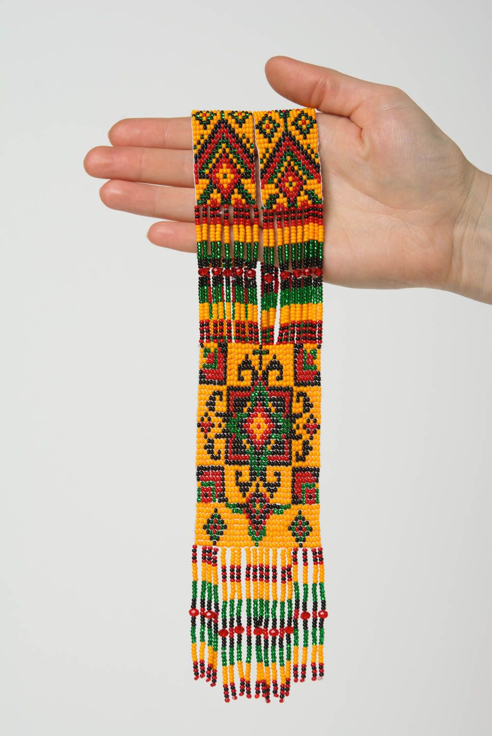 Collar hecho a mano de abalorios de estilo étnico artesanal largo anaranjado foto 4
