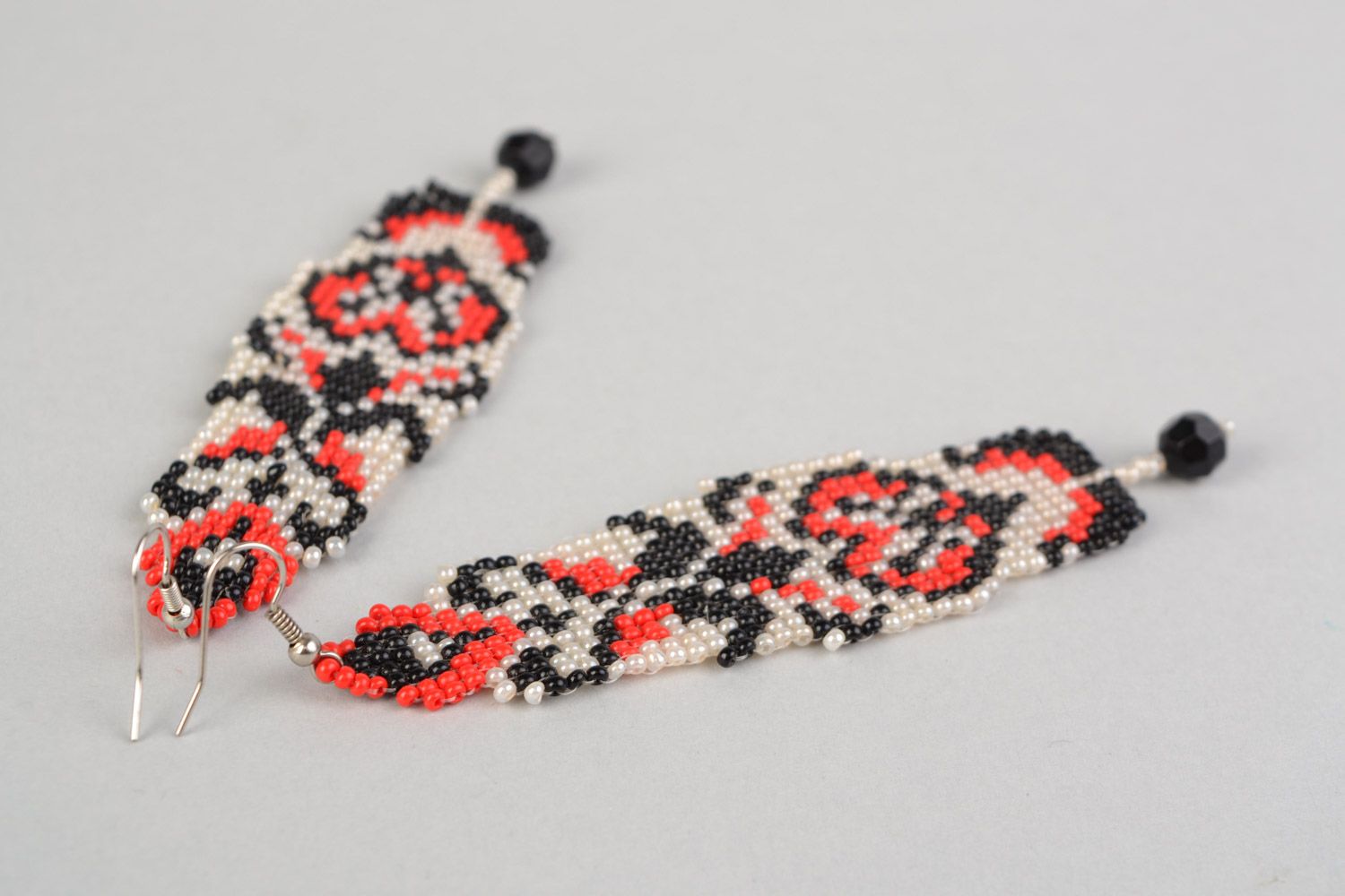 Handmade long dangling beaded earrings with ethnic motives black white and red photo 5