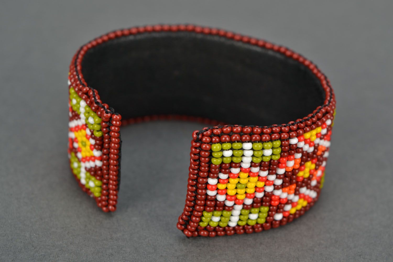 Cuff beaded bracelet in orange dark red and yellow colors photo 3