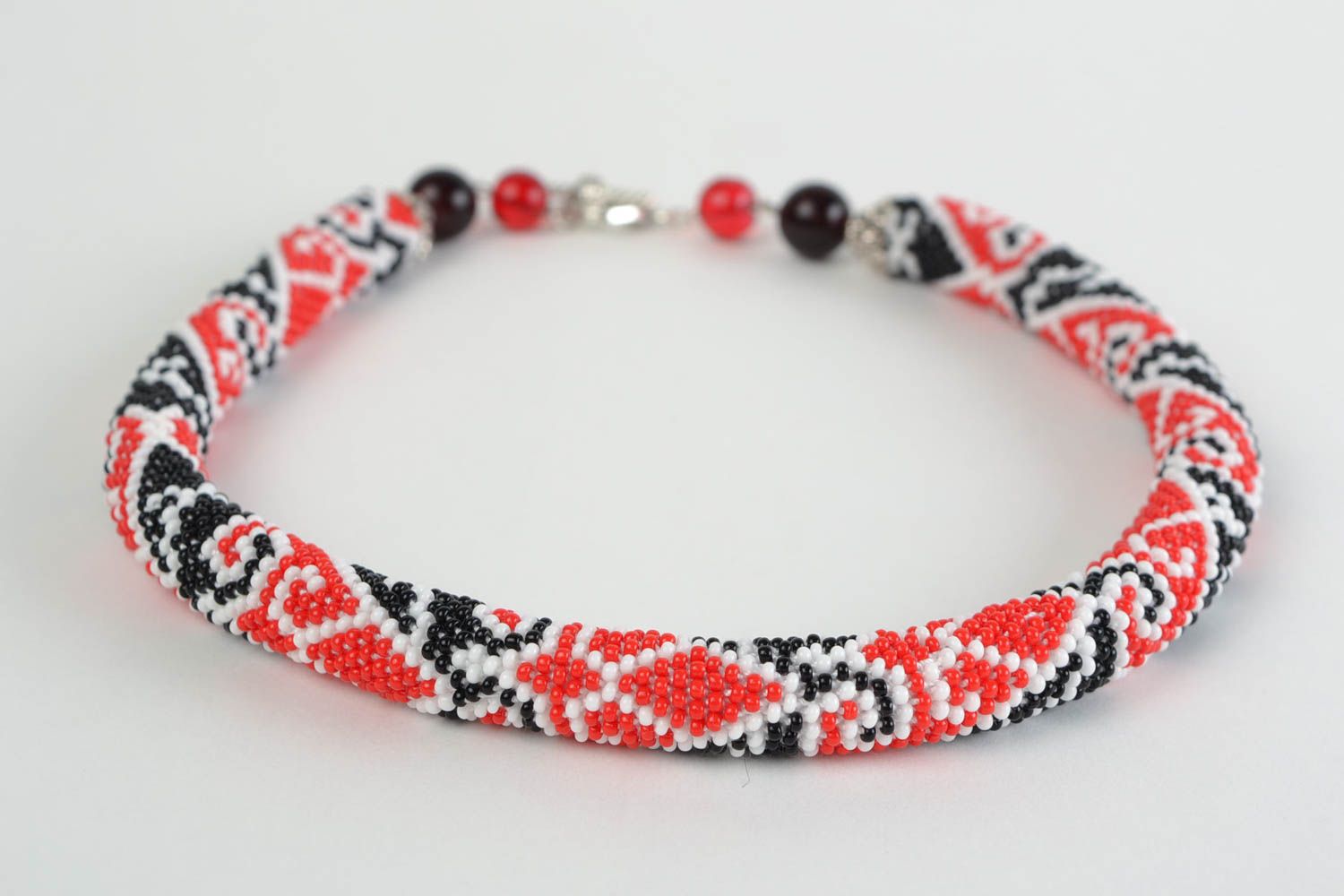 Unusual design handmade beaded cord necklace with ethnic patterns photo 5
