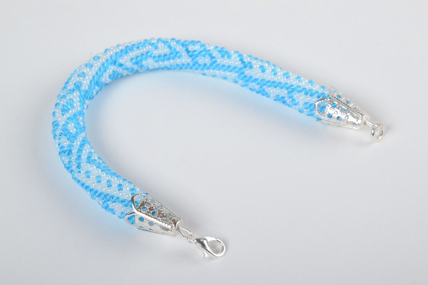 Stylish gentle handmade beaded cord bracelet of white and blue colors for women photo 4