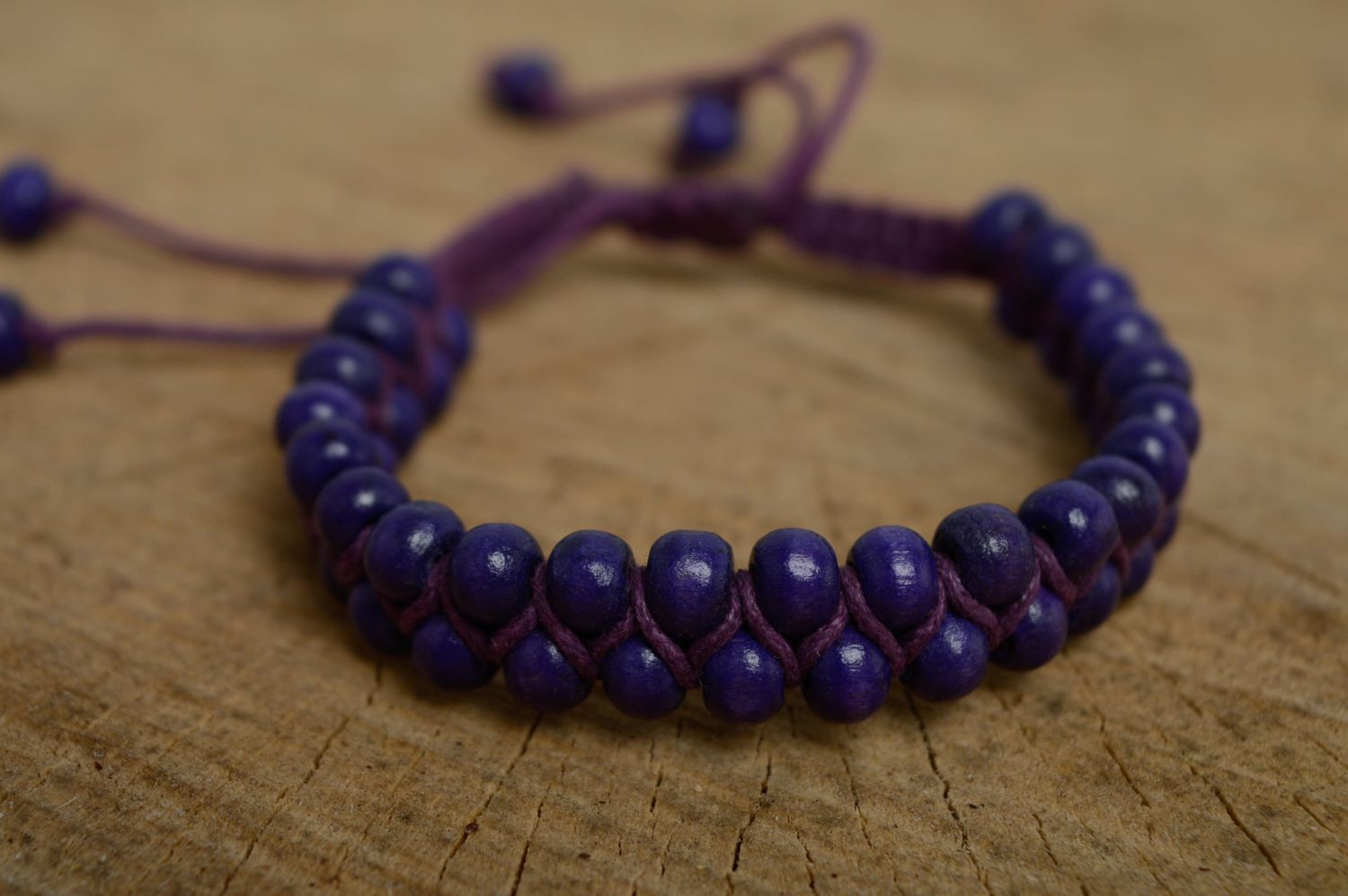 Violet macrame bracelet made of waxed cord and wooden beads photo 1