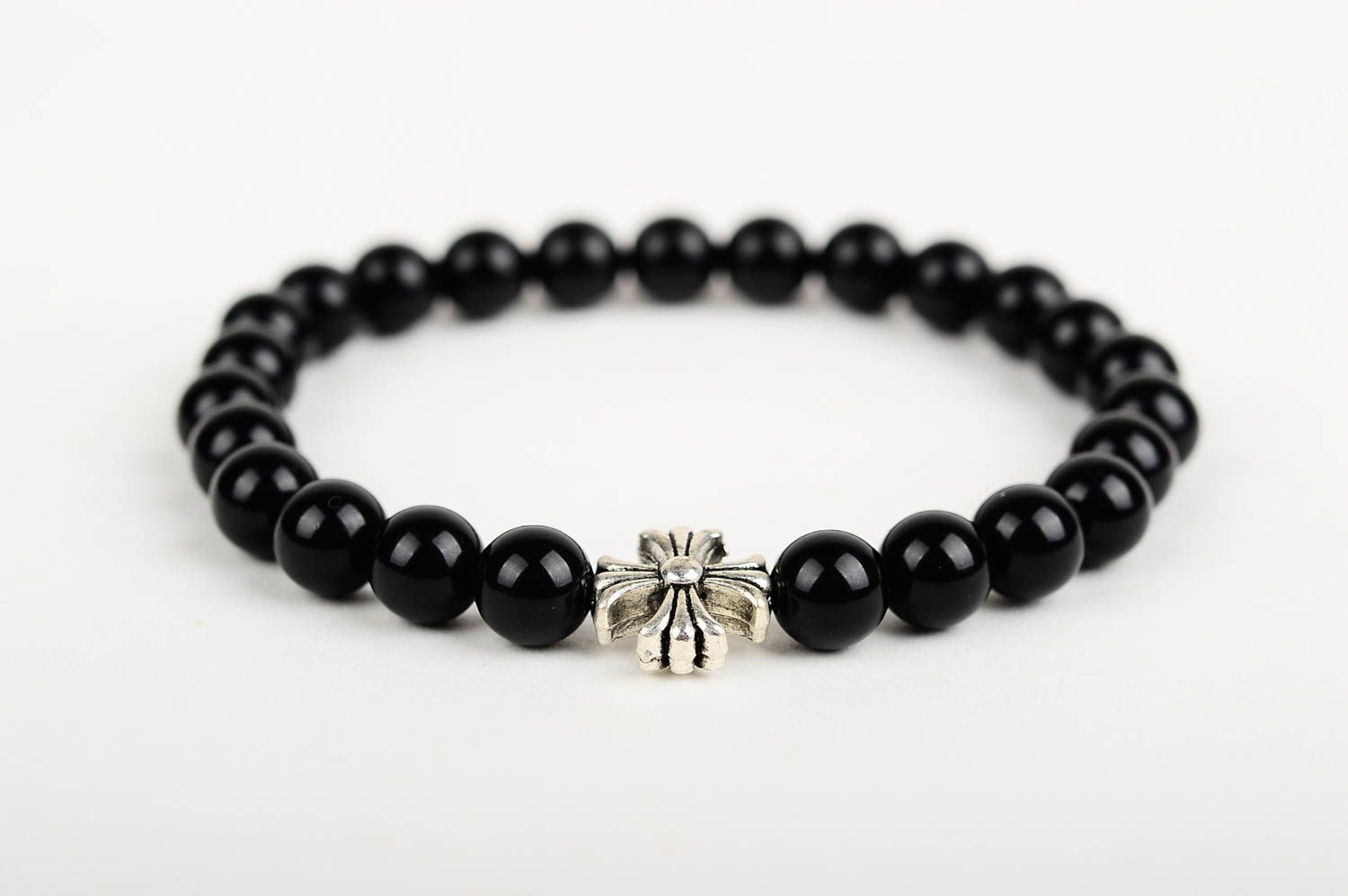 Metal cross and black beads unisex bracelet on an elastic string photo 3