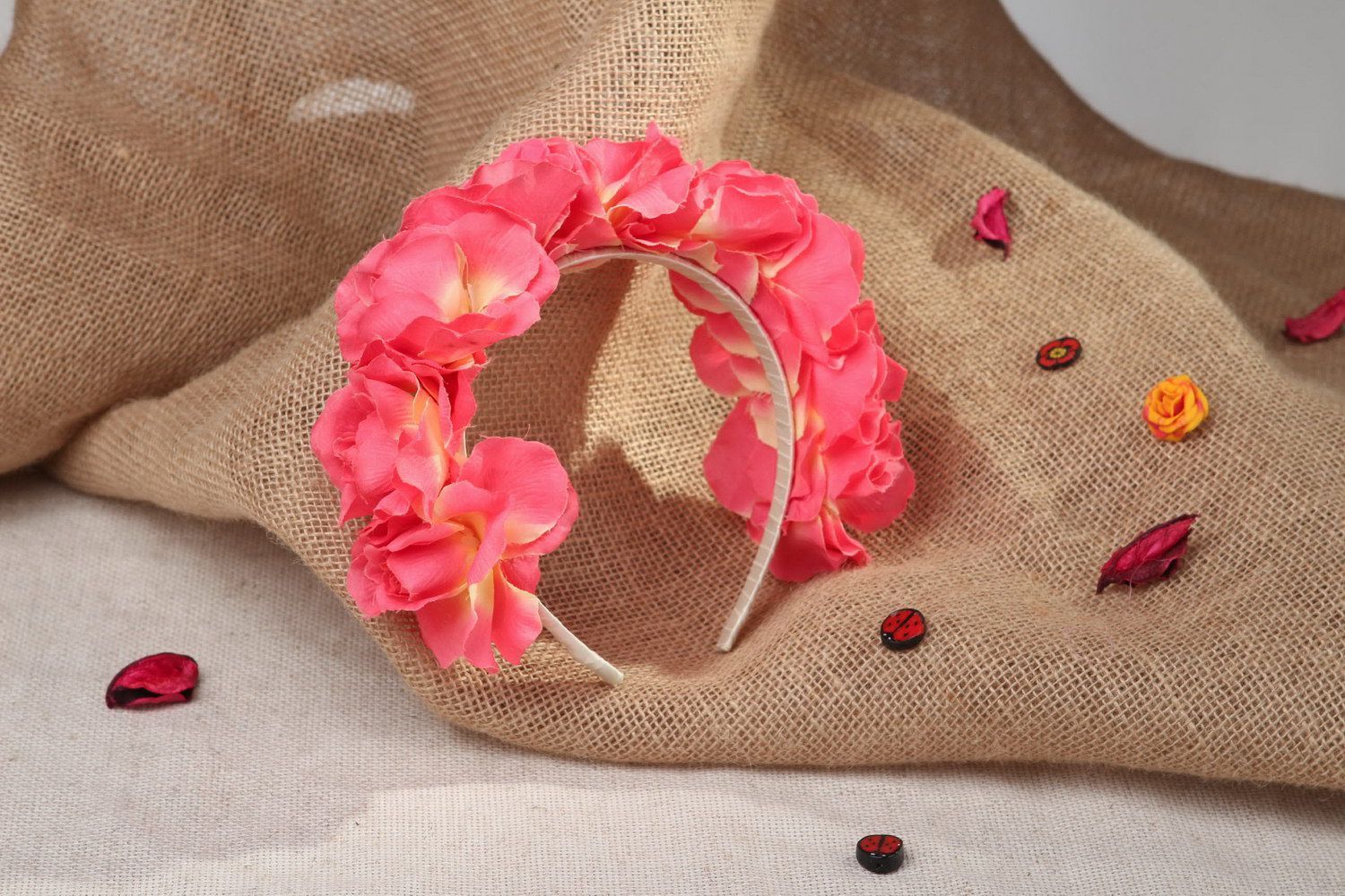 Pink wreath made of fabric flowers photo 1