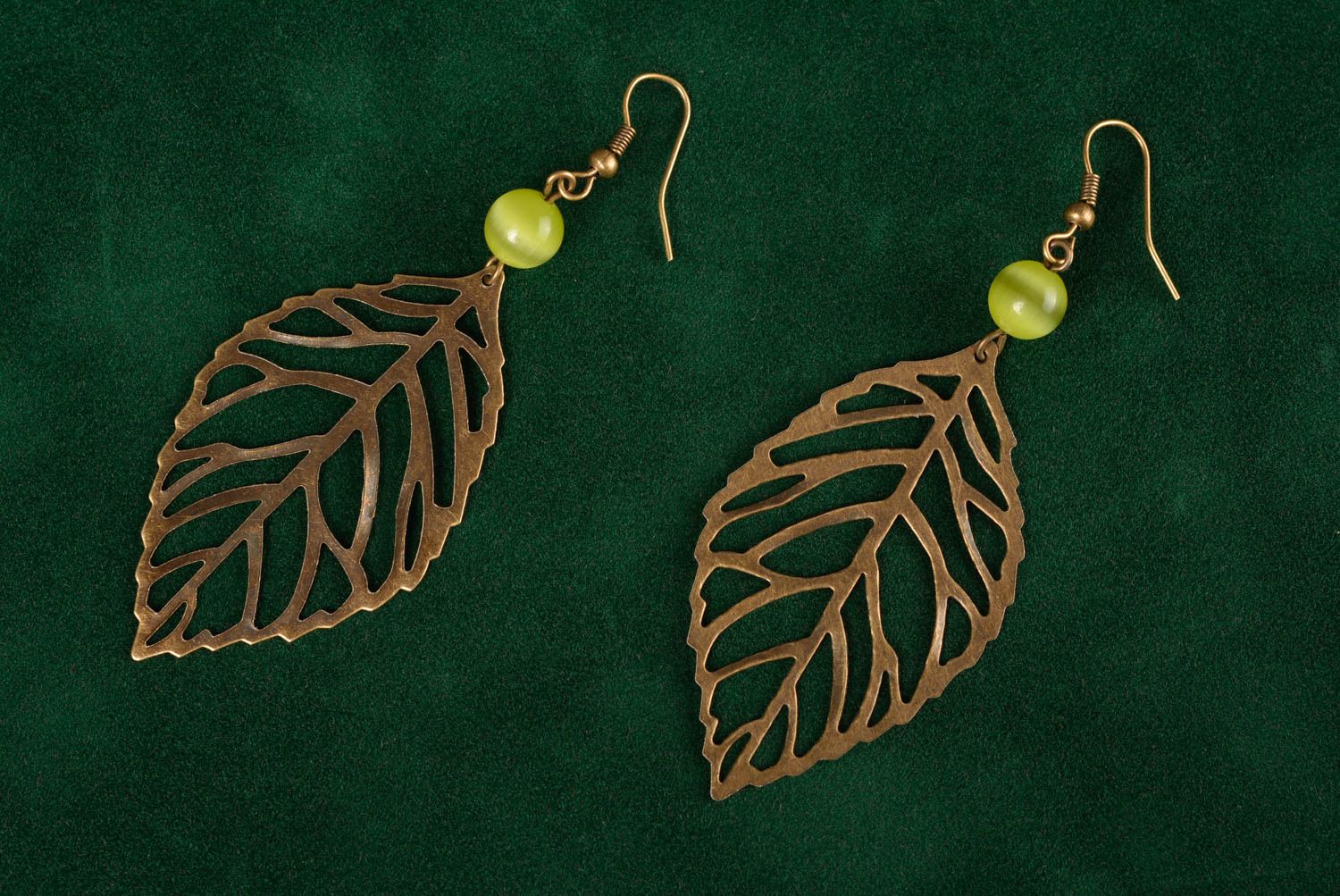Handmade designer earring with metal lacy leaves and green cat's eye stone  photo 1
