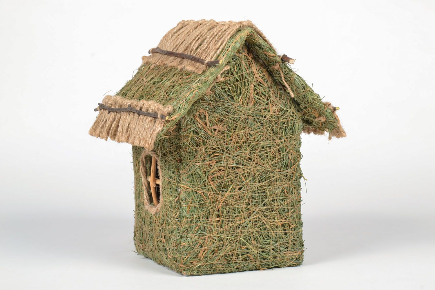 Decorative house made of forest grass photo 2
