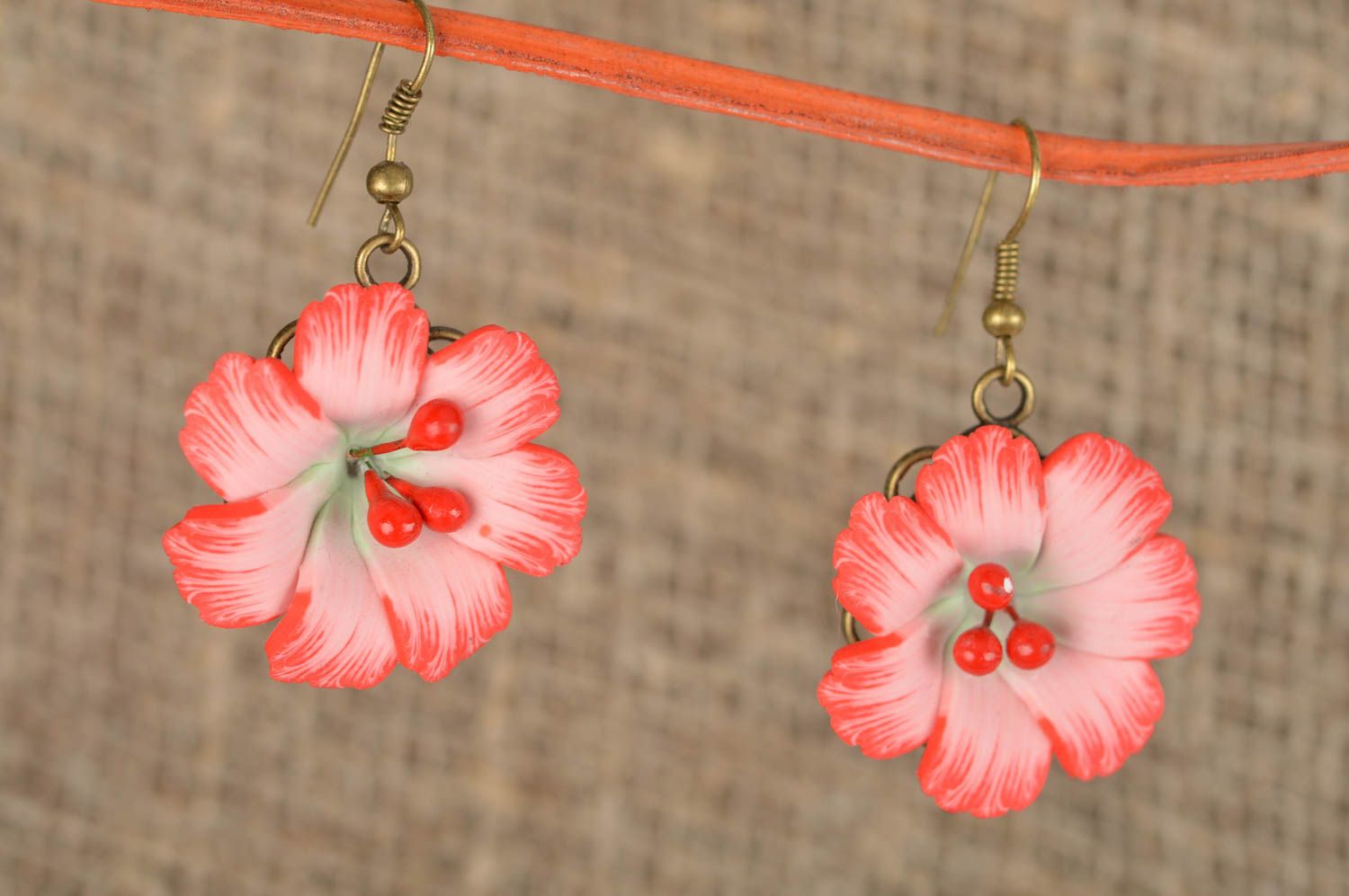 Cute small earrings with flowers made of polymer clay for stylish looks photo 1