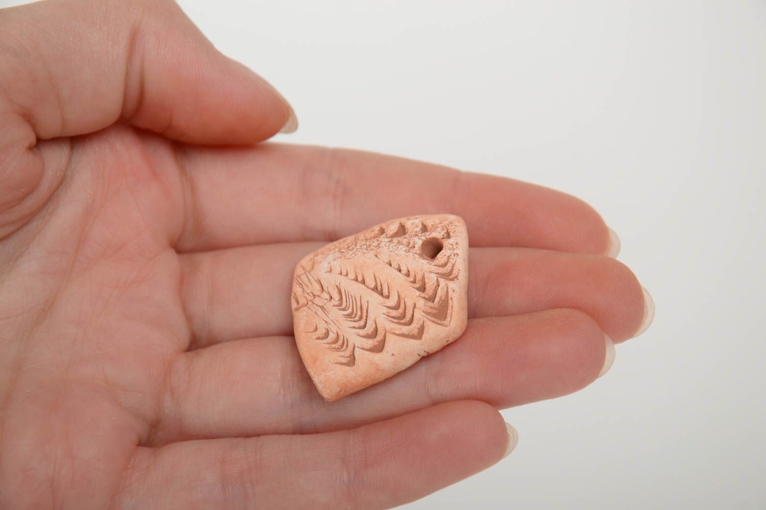 Small flat craft blank hand made of pottery clay for pendant necklace creation photo 5