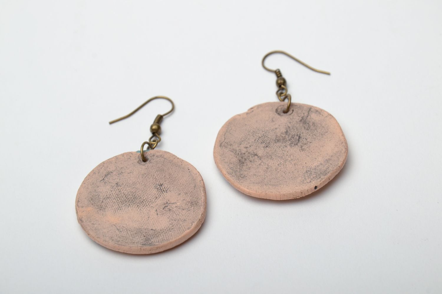 Ceramic earrings with stamp of plants photo 4