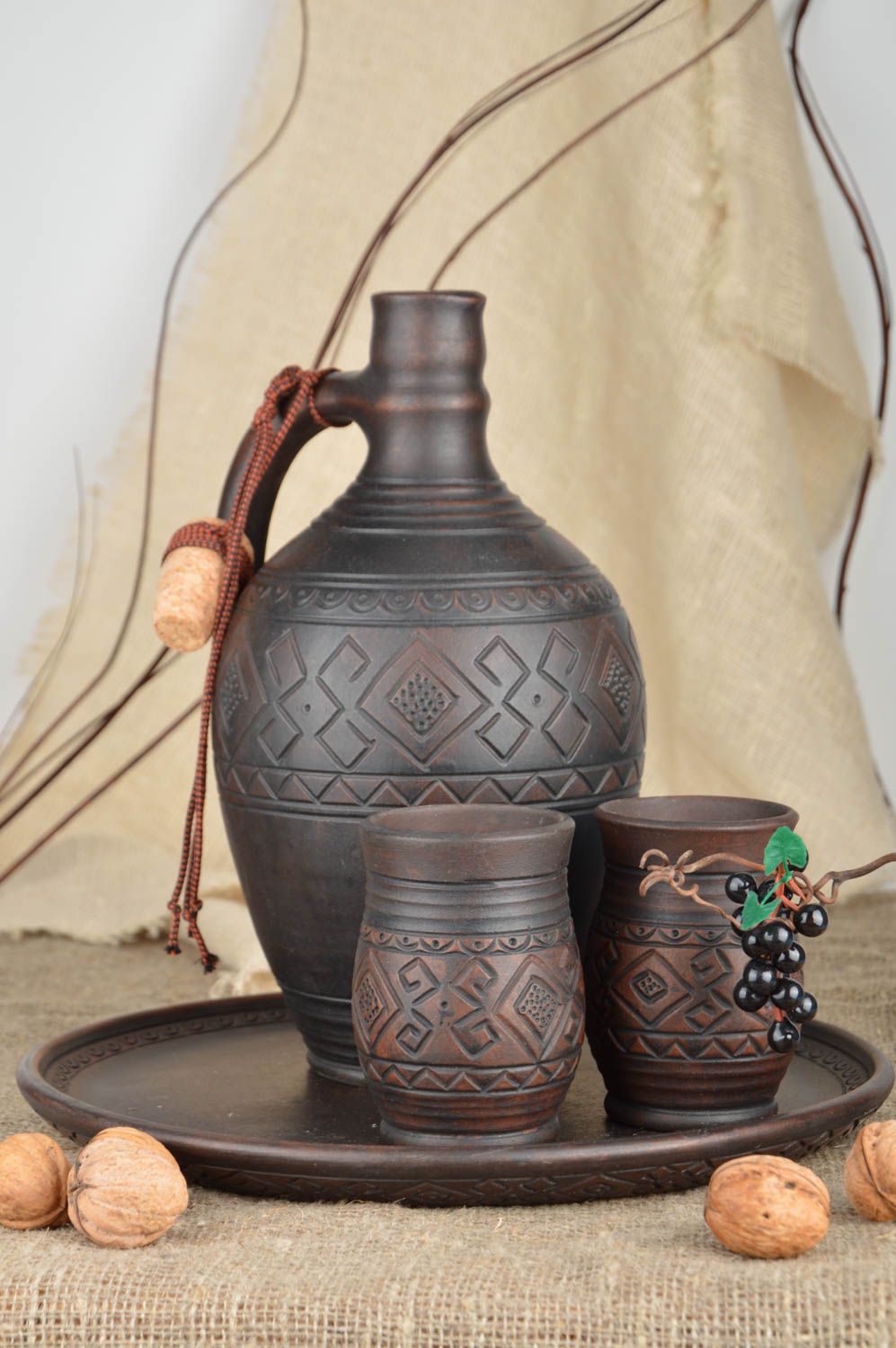 Set of handmade wine pottery in dark brown color ceramic pitcher-bottle for 66 oz and two wine 18 oz cups photo 1