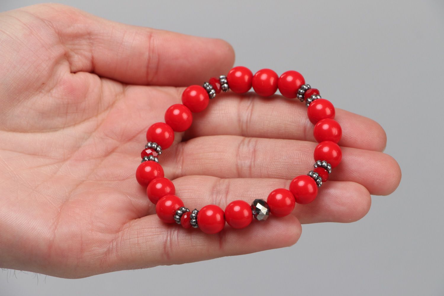 Women's red bracelet hand made of plastic and glass beads in 1 turn photo 3