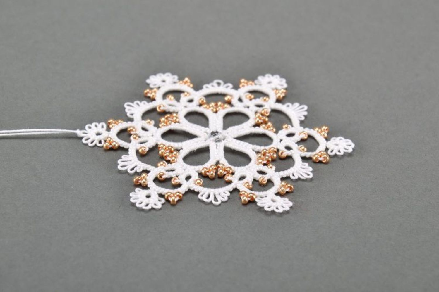Christmas tree lace decoration in the form of a snowlake photo 4