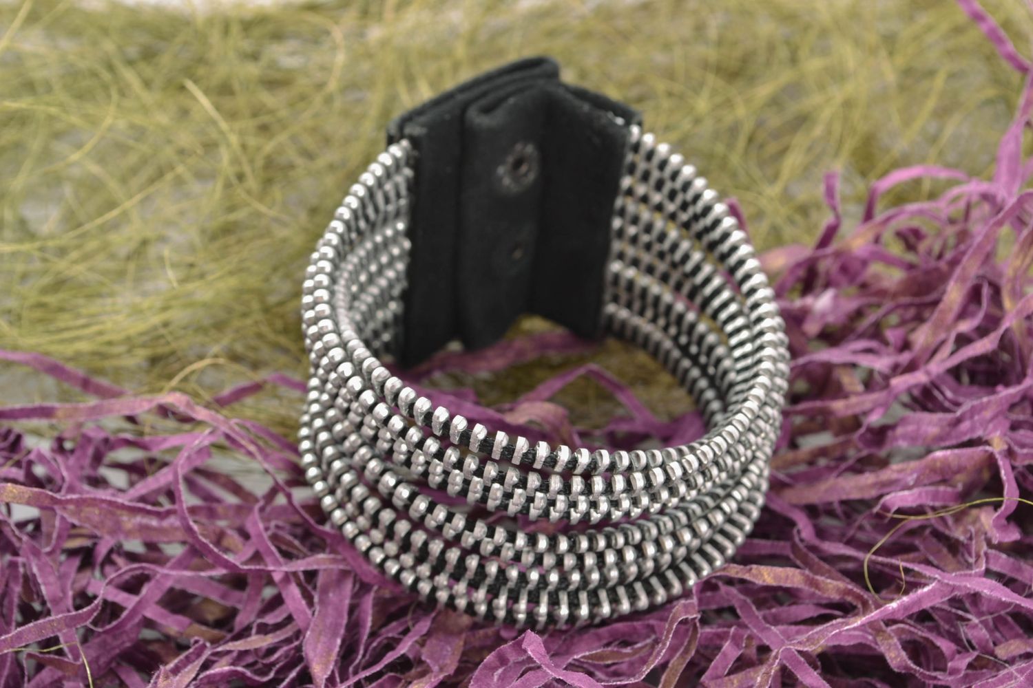 Natural suede bracelet with metal zippers photo 1