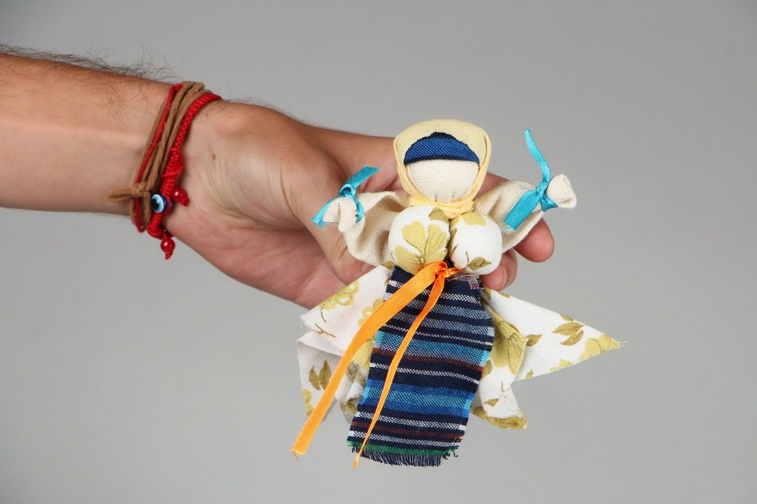 Muñeca étnica amuleto foto 1