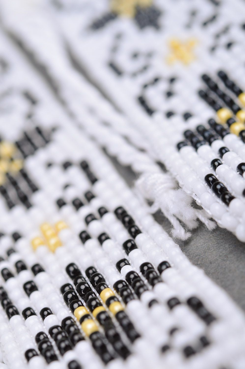 Bracelets en perles de rocaille fait main blanc avec dessin ethnique photo 4