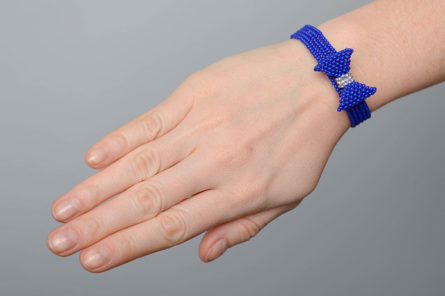 Blue handmade beaded bracelet with bow photo 2