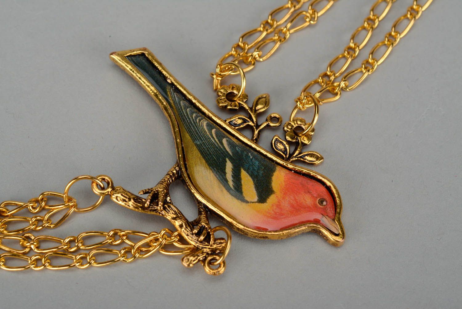 Halskette mit Vogel foto 1