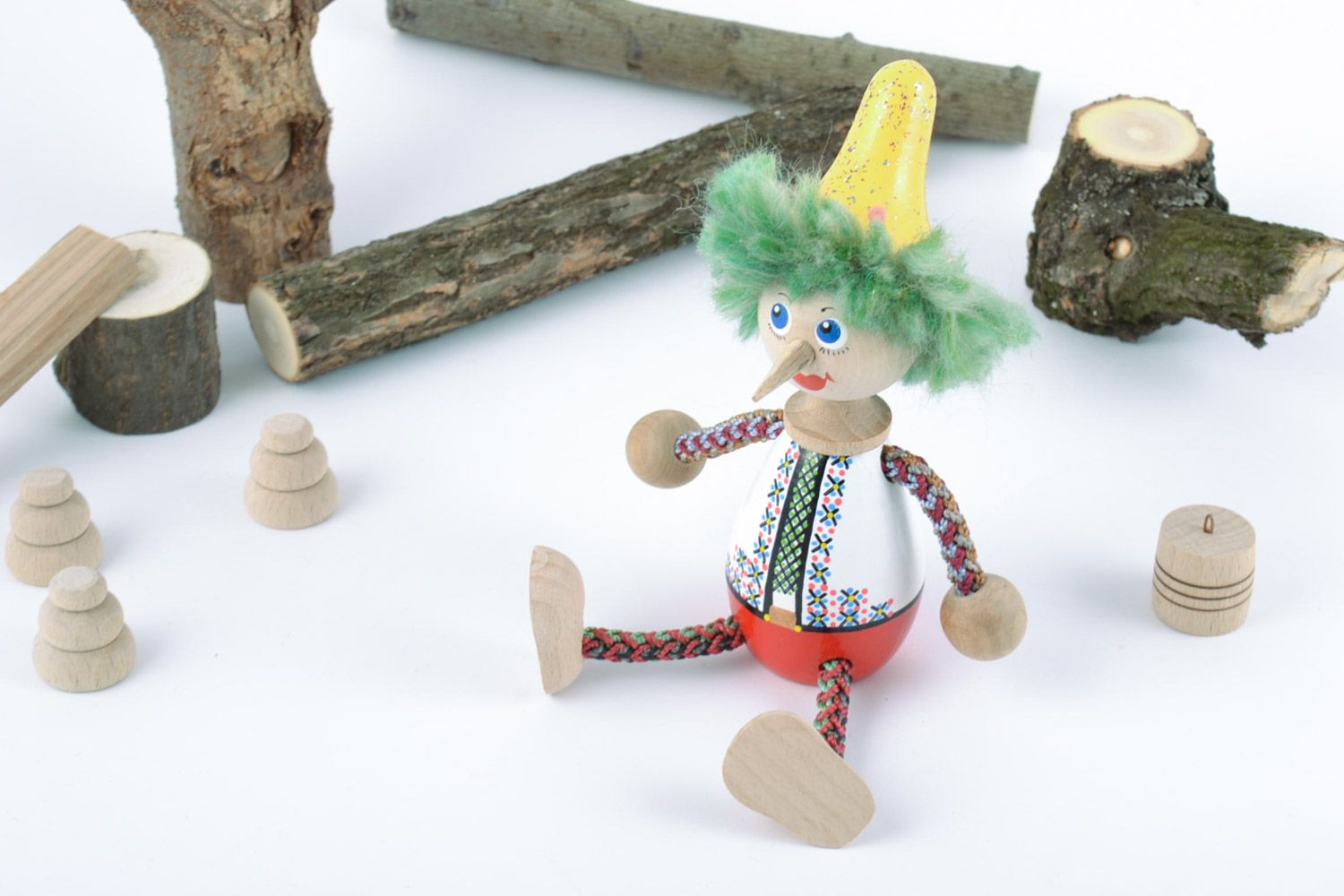 Homemade painted wooden toy clown with long nose for children photo 1
