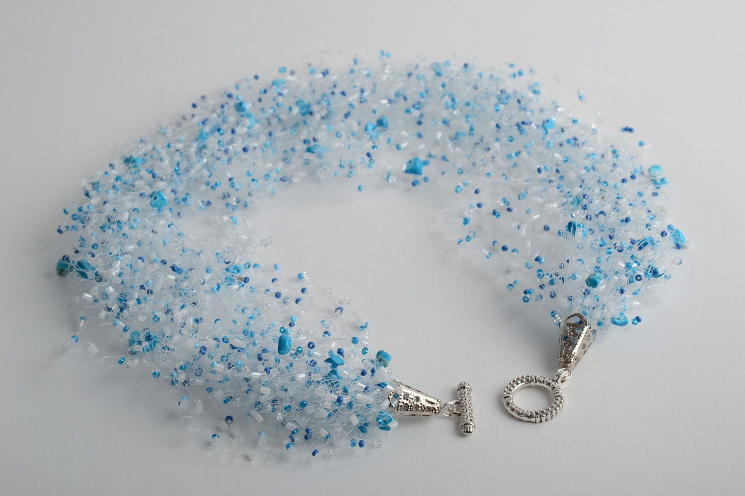 Handmade volume airy necklace woven of beads and fishing line in blue color photo 3